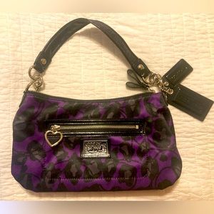 Coach Daisy Ocelot 
No H1281-F20024
Purple/Black Print Sateen Fabric Bag.